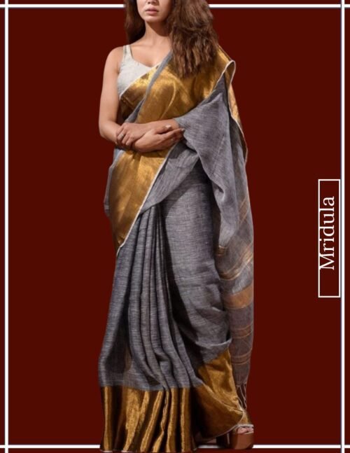 Woman wearing Mridula pure linen saree in grey with mustard yellow border
