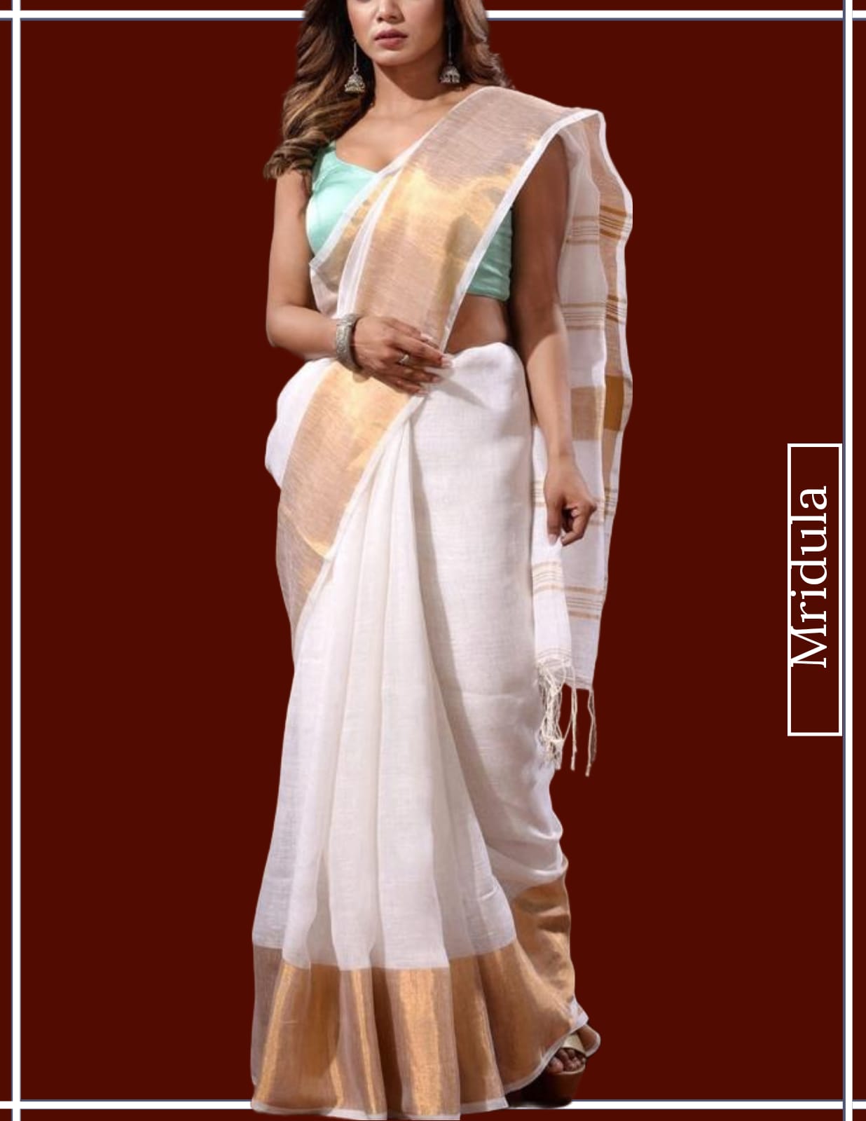 Woman draped in Mridula pure linen saree with golden zari border and pallu in Kerala style