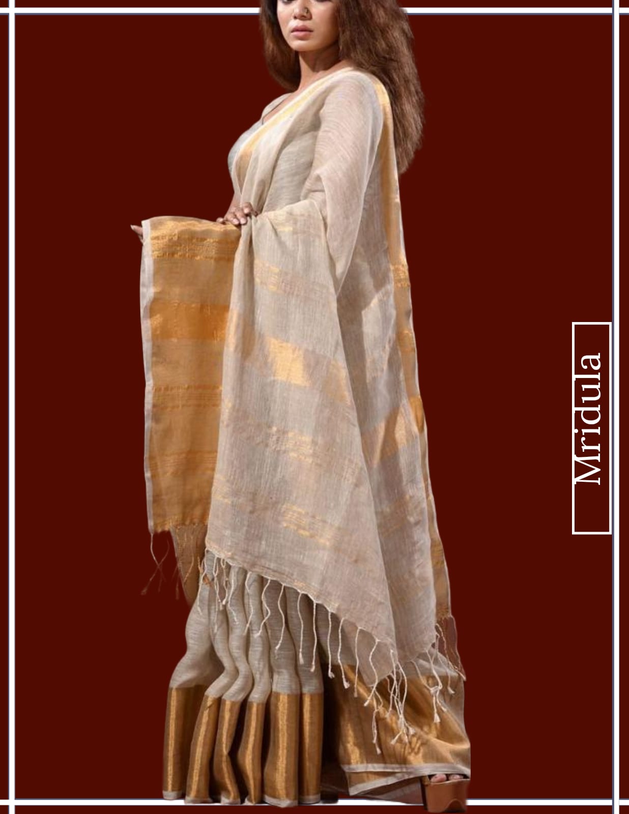 Model wearing beige handwoven linen saree with gold zari border from Mridula