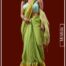 Woman wearing parrot green pure linen Kasavu saree with gold zari border