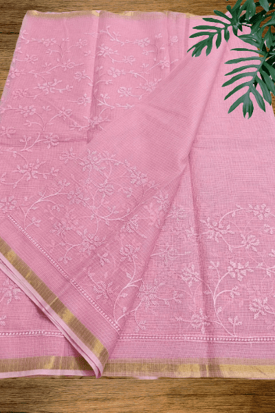 Pink Kota cotton saree with delicate floral embroidery and zari border