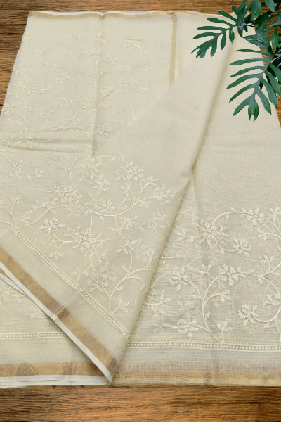 Mridula Off-White Kota Cotton Saree featuring floral embroidery and zari border