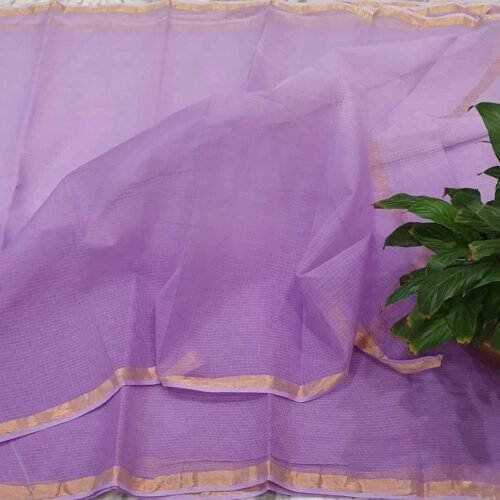 Lavender Kota cotton saree with golden zari border displayed flat