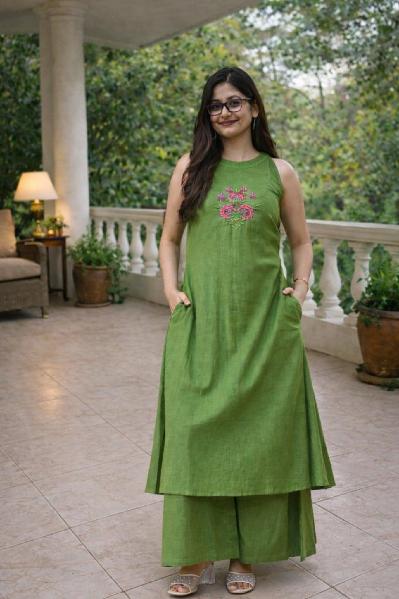 Woman wearing green cotton slub A-line halter neck co-ord set with embroidered kurta and palazzo pants