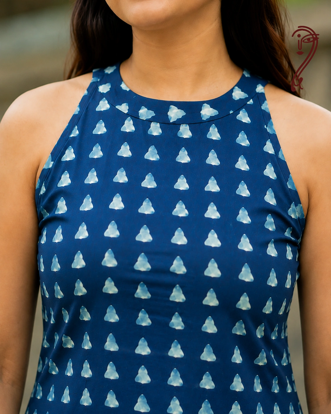 Close-up of triangle block print on cotton kurta pant set fabric