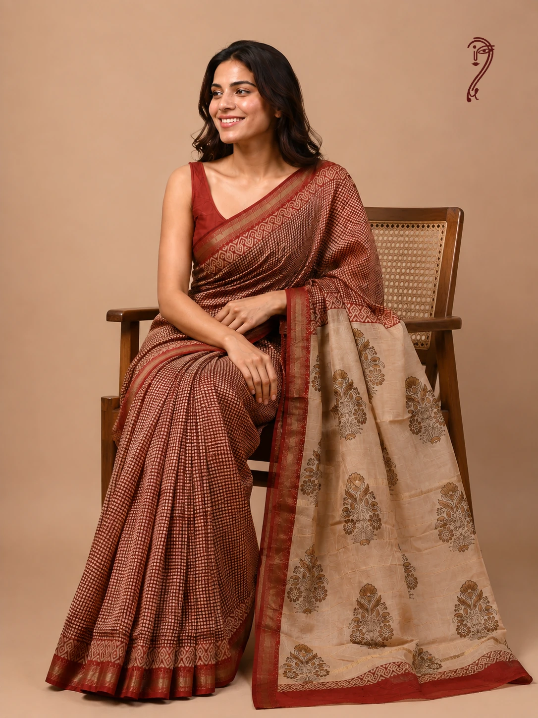 Maroon checks Maheshwari cotton silk saree with beige floral pallu and zari border from Chowkor Collection