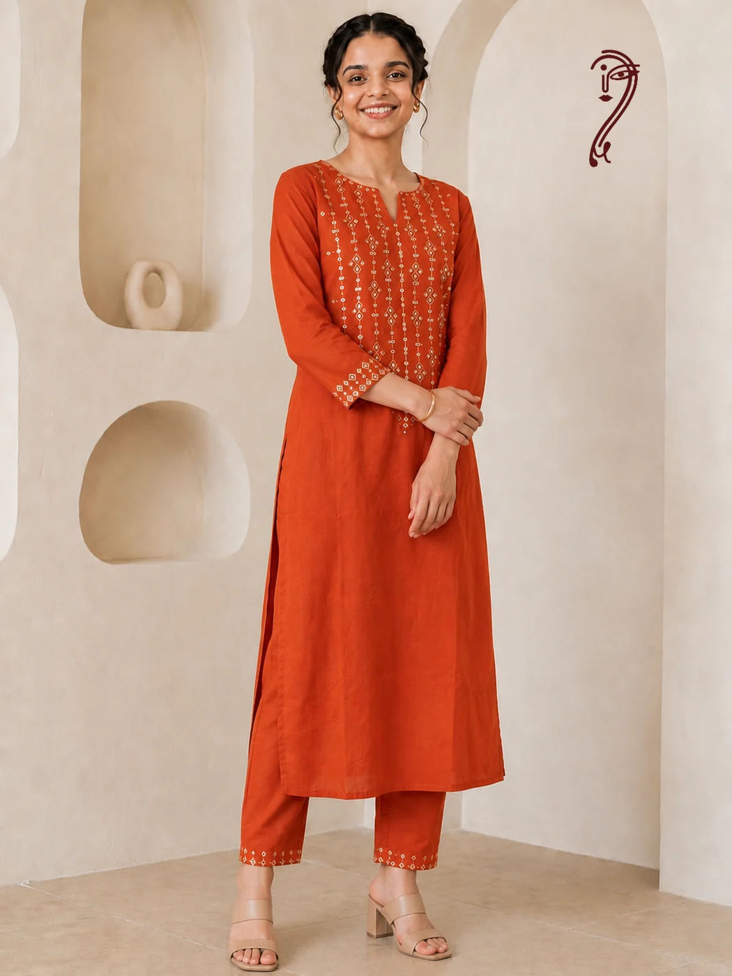 Rust orange embroidered cotton kurta set for women, full front view with mirror work embroidery