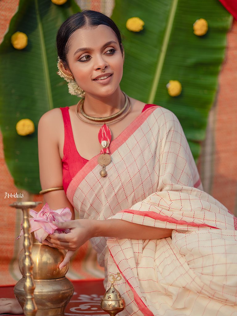 Mridula Lalrekha red and white cotton saree in a festive handwoven look